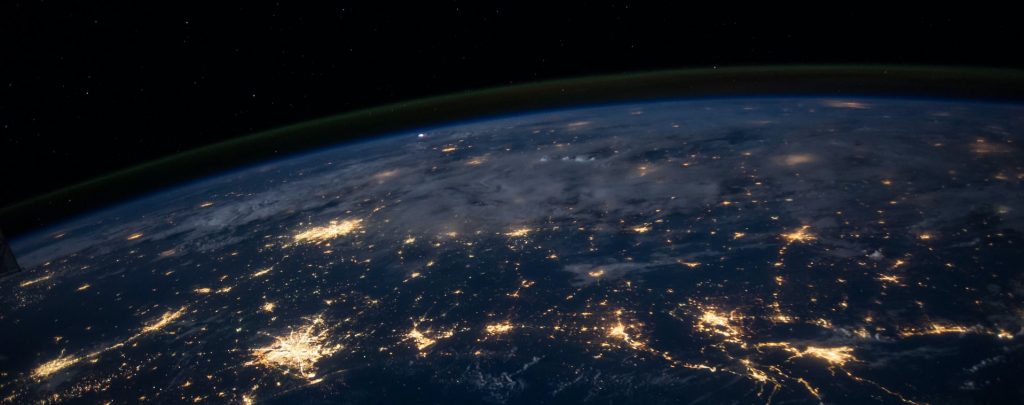 Earth from space, with lit up, networked cities