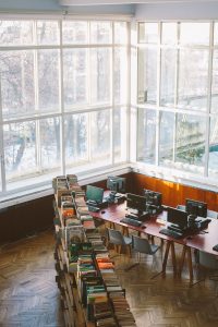 Computers and books in a library