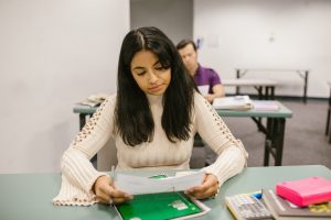 Woman looking at paper