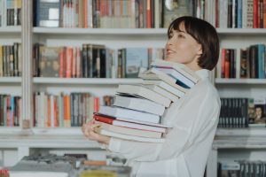 Woman carrying books