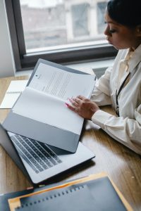 Women reading report at a desk