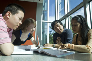 Four college students studying