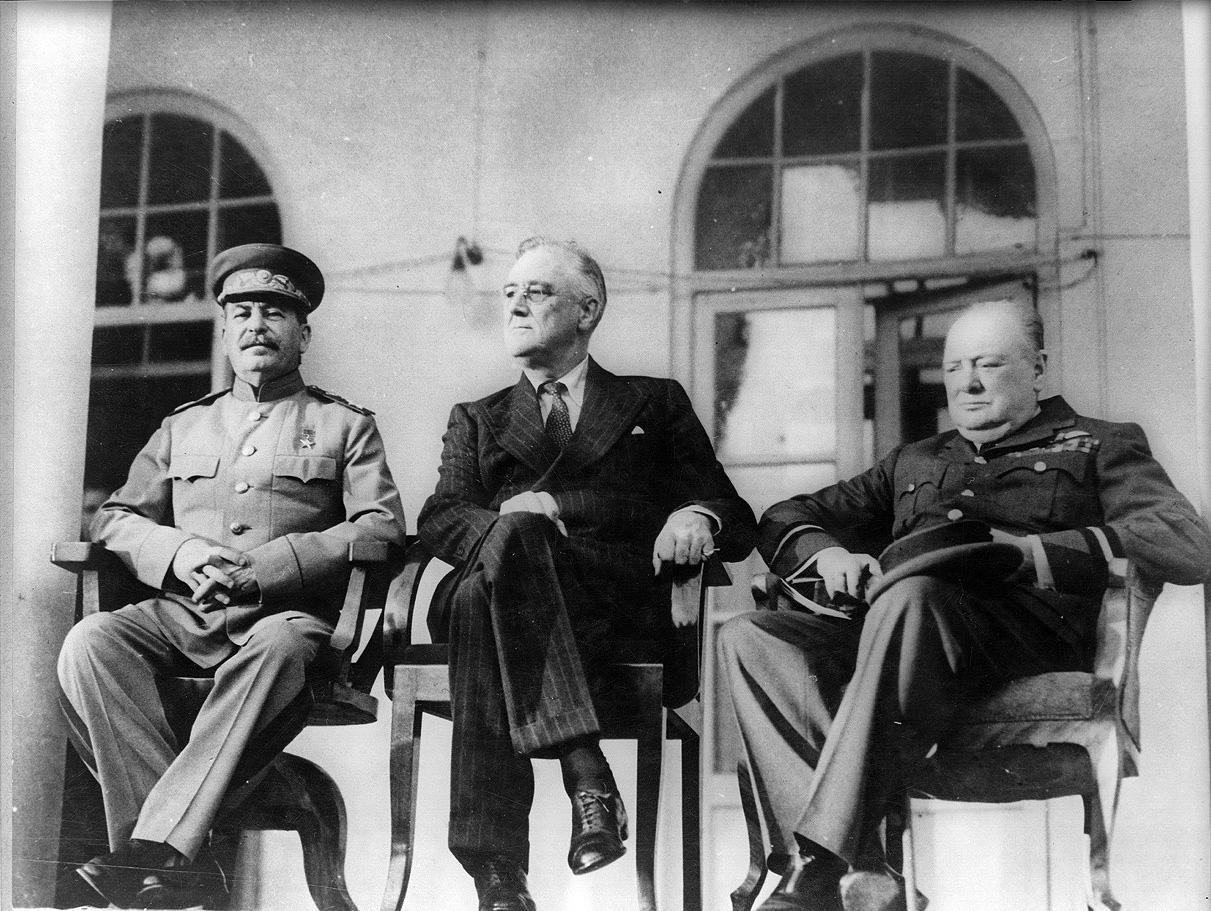 A photo of Josef Stalin, Franklin Delano Roosevelt, and Winston Churchill